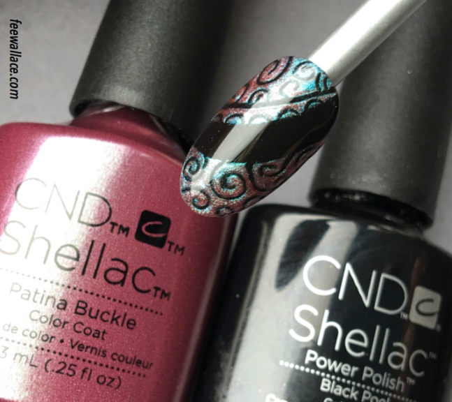 shellac nail art with black pool and patina buckle by fee wallace