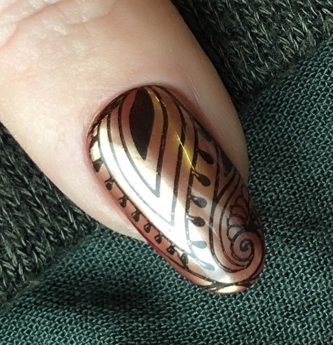shellac red baroness with lecente layer it and lecente bronze chrome powder, plus stamping by fee wallace