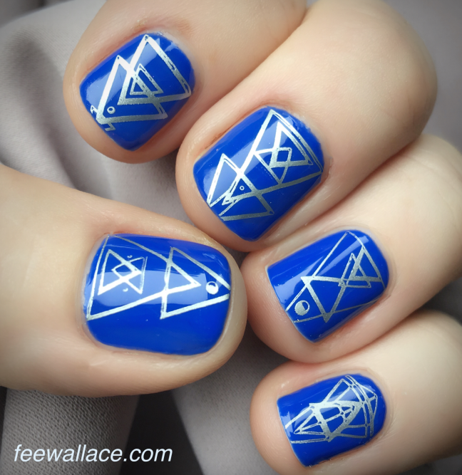 yours loves fee stamping with halo elements plate over shellac blue eyeshadow