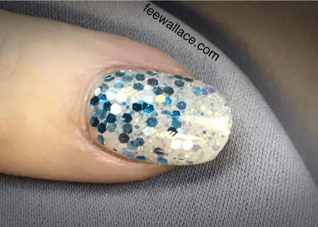 Lecente chunky glitter AQUAMARINE over shellac naked naiveté with golden white multi-glitz glitter